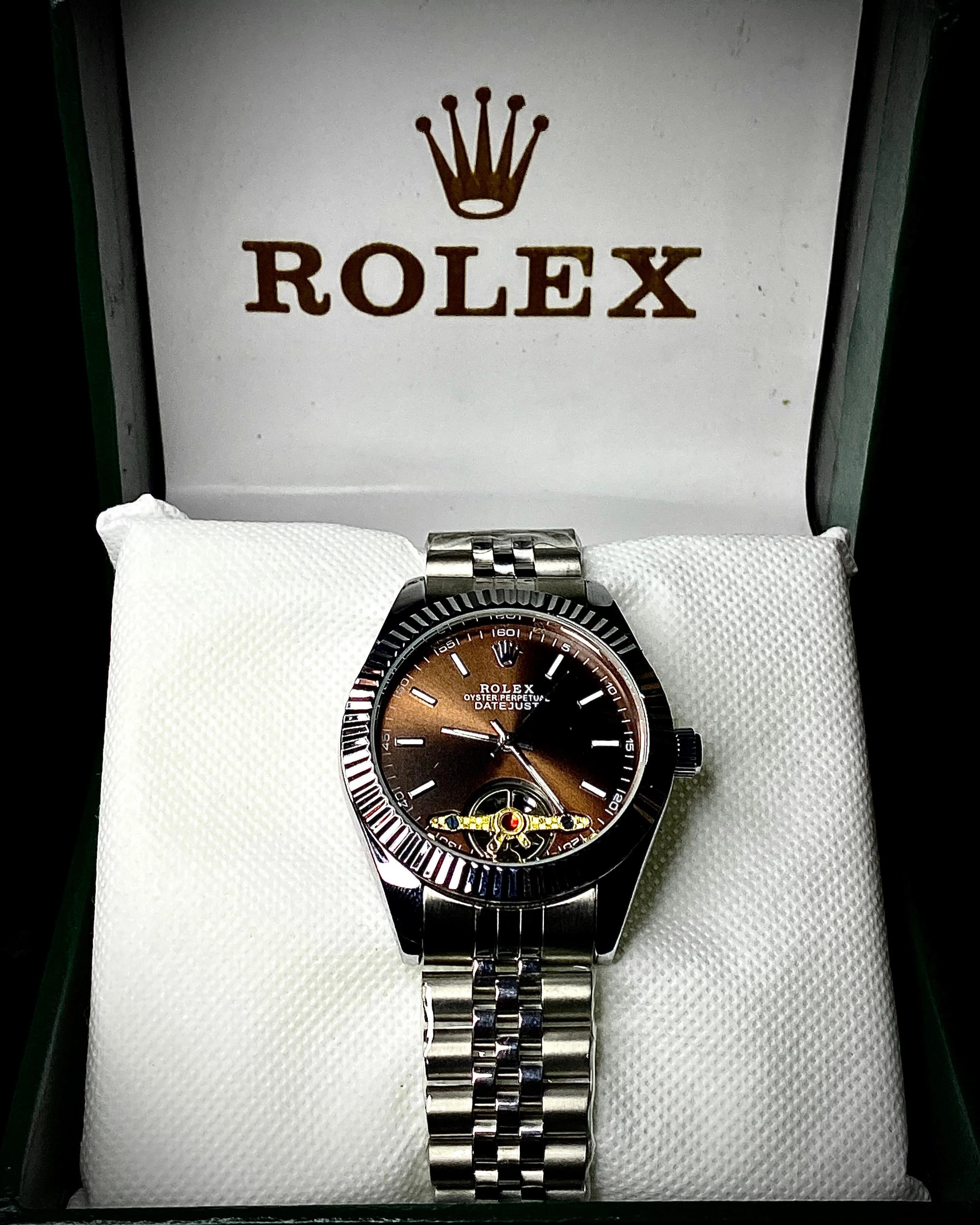 Rolex watch in a branded box